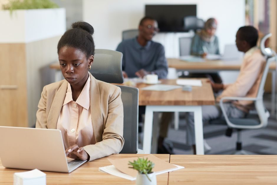 How to work — Productive Work Environment With A Person Working On A Laptop