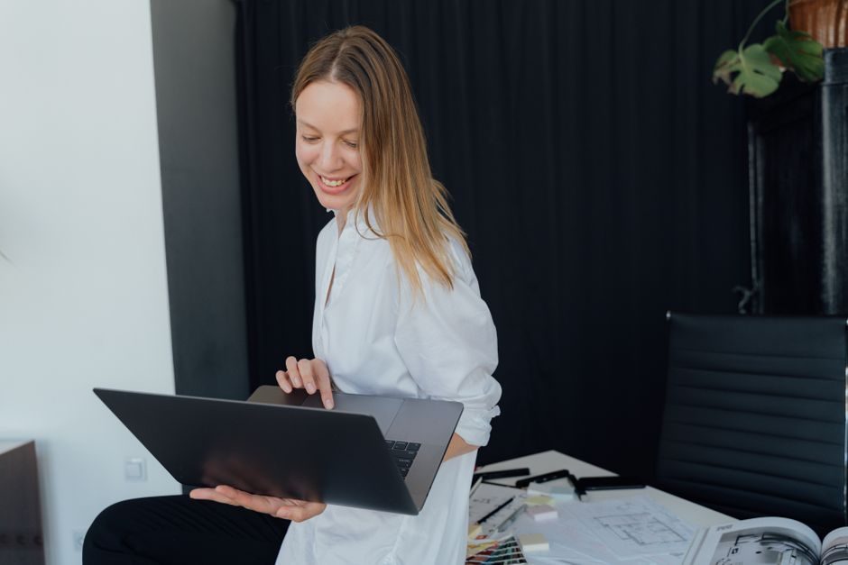 How to work on fiverr — Fiverr Workspace With A Laptop And A Happy Freelancer